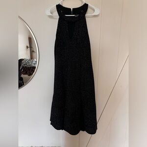 Black sparkly dress with halter neck and flowy bottom